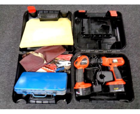 Two plastic tool boxes containing Black and Decker drill, hand tools