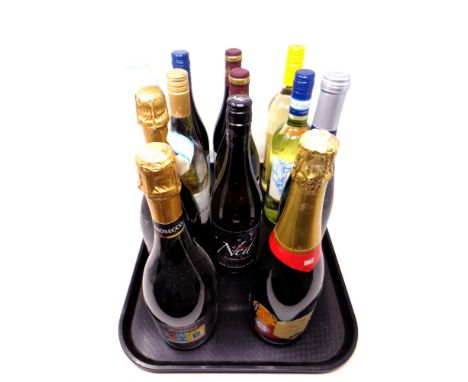 A tray of eleven bottles of wine. 2012 Cava, Prosecco etc 