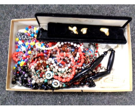 A small collection of costume jewellery, beaded necklaces, simulated pearls etc 