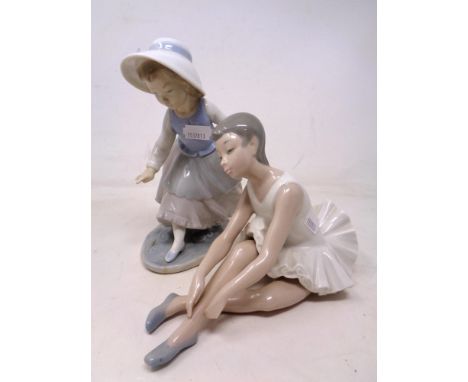 A Nao figure of a seated ballerina and a further figure of a girl