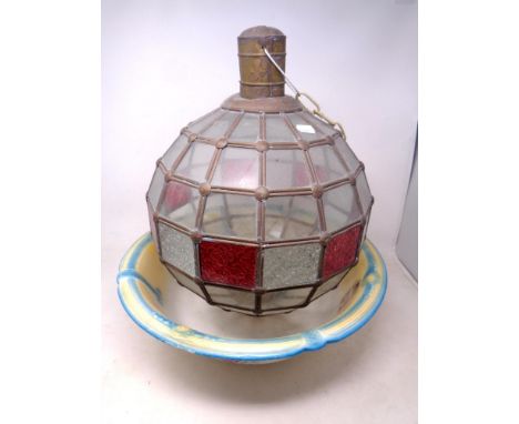 An antique pottery wash bowl together with a spherical glass pendant light shade 