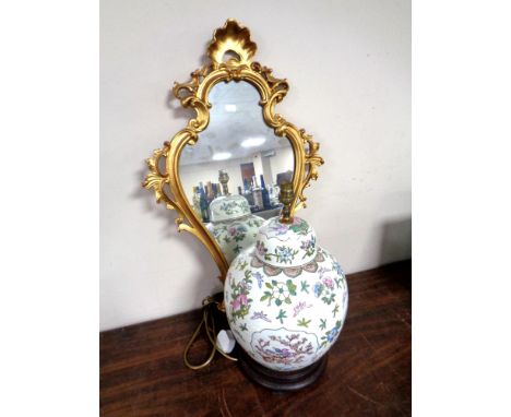 An Oriental style ceramic table lamp together with a gilt framed mirror 