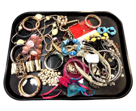 A tray of costume jewellery, beaded necklaces, bangles, dress rings etc 