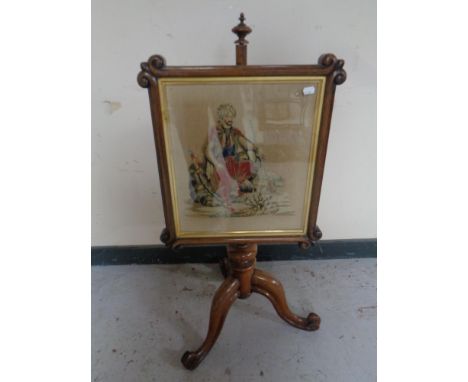 A Victorian rosewood tapestry pole screen 