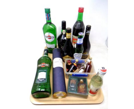 A tray of alcohol including Martini, Ouzo, vintage character port, miniatures etc 