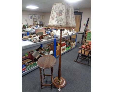 An oak shaped occasional table together with a beech standard lamp 