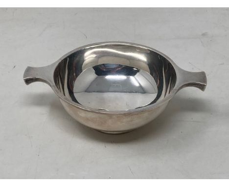 A silver quaich, Hamilton &amp; Inches, Edinbrugh 1930, 142.3g. CONDITION REPORT: Light engraved italic 'A' to side. Good con