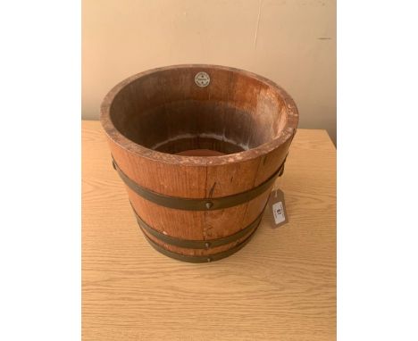 R A Lister &amp; Co Ltd. : A coopered barrel planter/wine holder, with twin brass hoop handles, diameter at top 26 cm, height