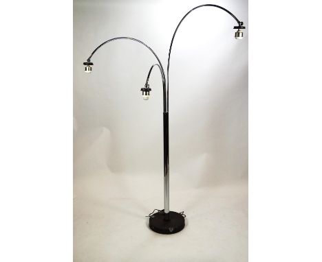 A chrome finished floor lamp with three moveable arch arms rising from a central column on a cast metal base, max 205cm high