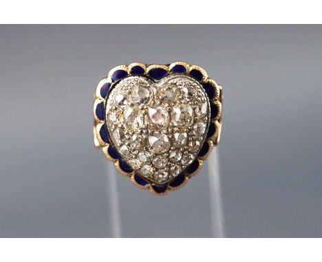 A yellow metal heart shaped ring set with twenty four old brilliant cut diamonds measuring from 2.00mm to 4.00mm. Approximate