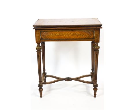 A Kingwood Louis XVI Adam Weisweiler style games table, the brass edged rectangular folding top with stringing and quartered 