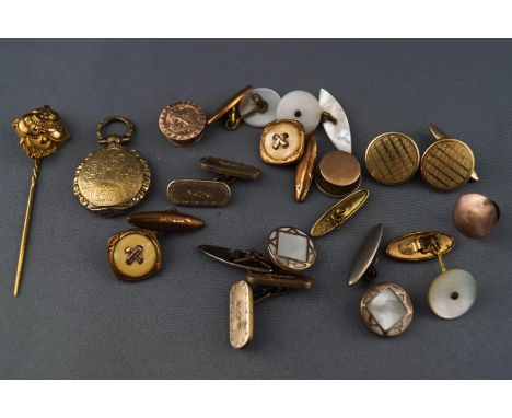 A collection of jewellery to include a mourning locket (with hair), a abstract stick pin and a collection of cufflinks and sh