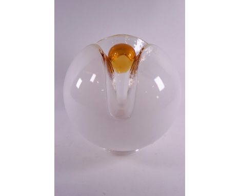 A 1960's Art glass lamp shade/light cover of floral form in opaque glass with an orange centre, approximately 25cm diameter