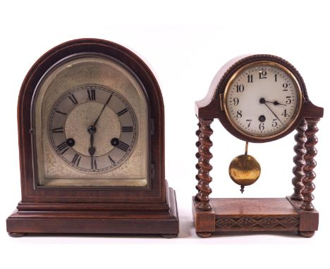 A mahogany cased dome topped clock with striking mechanism and another timepiece, 25cm high