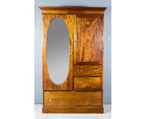 An Edwardian Mahogany and Inlaid Wardrobe by Maple &amp; Co,&nbsp;with moulded cornice, fitted cupboards with hanging rails, 