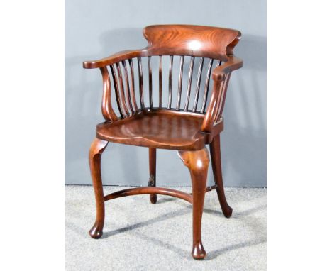 A Late Victorian Walnut "Smokers Bow" Armchair,&nbsp;with shaped horseshoe pattern back, moulded uprights, dished seat, on ca