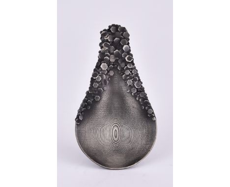An Elizabeth II Silver "Granite" Caddy Spoon, by Hamish T Dobbie, Edinburgh 2015, with oxidised finish, the circular bowl wit