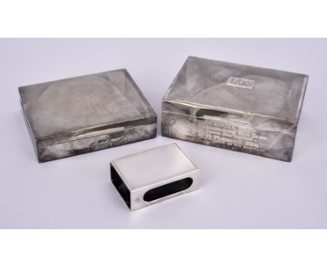 Two Elizabeth II Silver Cigarette Boxes and a Matchbox Holder,  all with engine turned ornament, one box by William Neale & S