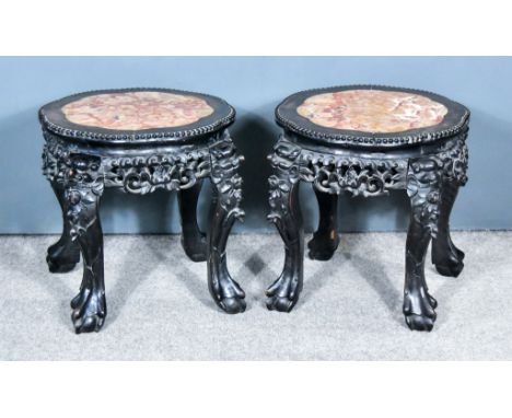 A Pair of Chinese Hardwood Jardiniere Stands, Late 19th/Early 20th Century, with pink flecked marble slab insets to top, fret