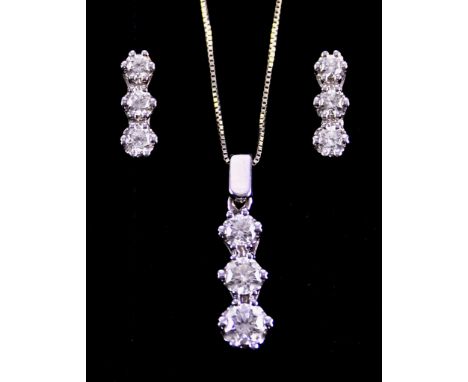 An 18ct White Gold Diamond Suite, comprising -&nbsp;a diamond drop pendant suspended from a fine 18ct white gold chain, set w