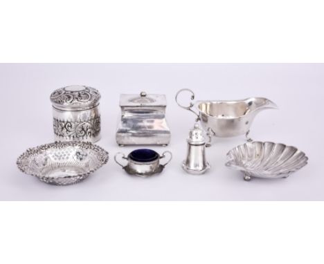 An Edward VII Silver Rectangular Tea Caddy and Mixed Silver, the caddy by Mappin &amp; Webb, London 1905, with oval domed lid