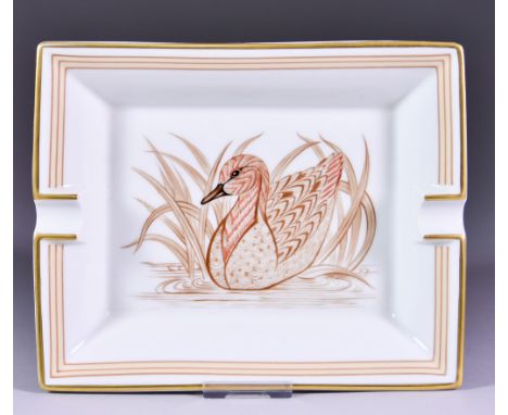 A Hermes Porcelain Rectangular Ashtray, decorated with a duck amongst reeds, gilt edged, 7.875ins x 6.5insThe suede(tte?) on 