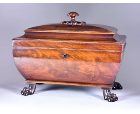 A William IV Mahogany Rectangular Tea Caddy of Sarcophagus Shape, the slightly domed lid with spiral turned finial, the inter