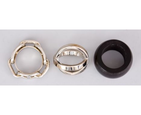 Three Hermes Scarf Rings,&nbsp;comprising - a plated Regate scarf ring, a plated Cosmos scarf ring, and an ebonised scarf rin