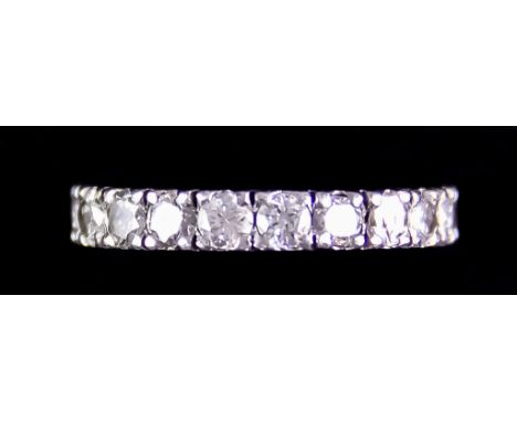 A Platinum Diamond Eternity Ring, Modern, set with brilliant cut white diamonds, approximately .75ct total, size J, gross wei