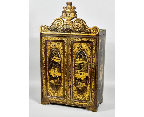 A Chinese Black Lacquer Table Cabinet, Late&nbsp;19th Century,&nbsp;the whole decorated in gilt with chinoiseries, with scrol