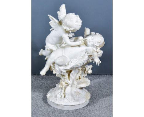 19th Century Italian School - White alabaster group - Cupid awakening a young child resting on a leafy bower, on circular bas