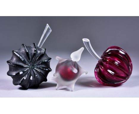 Ian Hankey - Two glass scent bottles and stoppers, including - an upcycled glass "fossil" shaped bottle, signed with monogram