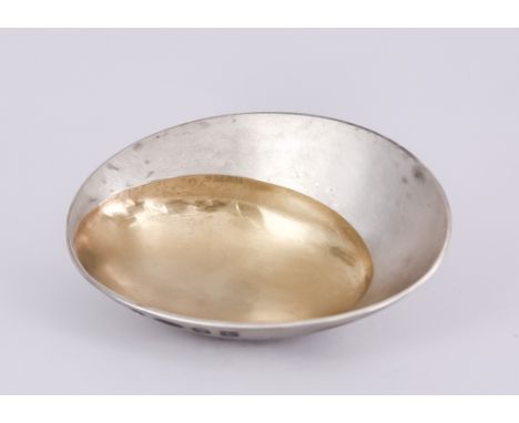 An Elizabeth II Britannia Standard Silver and Silver Gilt Oval Caddy Spoon, by Jessica Jue, London 2018, with gilt bowl, the 