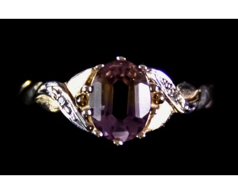 An 18ct Gold Solitaire Ametrine Ring, set with a centre ametrine stone, approximately 1ct, flanked by small white stones, siz