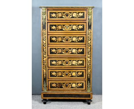 An Early 19th Century Walnut, Ebonised and Gilt Metal Mounted Semainier, with white flecked marble slab to top and floral and