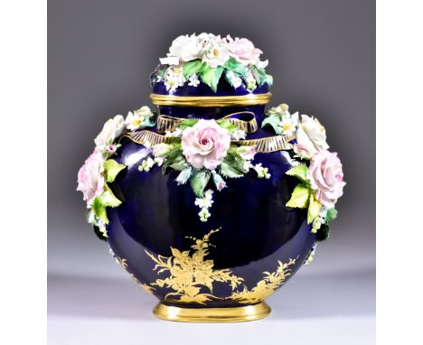 The Four Seasons Vase - A Lynton Porcelain Flattened Ovoid Vase and Cover, by Marian Czuplak, encrusted with roses, daisies a