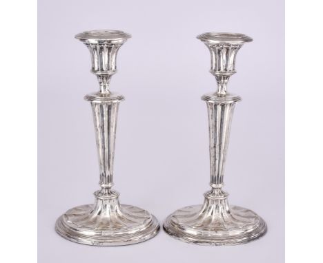 A Pair of Edward VII Silver Oval Pillar Candlesticks of Neo Classical Design, by I.S. Greenberg & Co, Birmingham 1904, with r