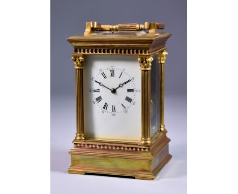 A Late 19th/Early 20th Century French Carriage Clock, No.986, the white enamelled dial with Roman numerals to the eight day t