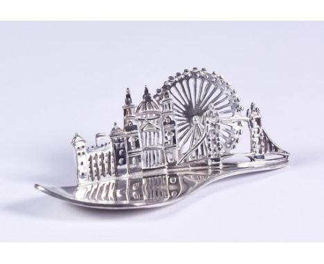 An Elizabeth II Silver "London Skyline" Caddy Spoon, by Jen Ricketts, Sheffield 2016, the shaped bowl with hand pierced skyli