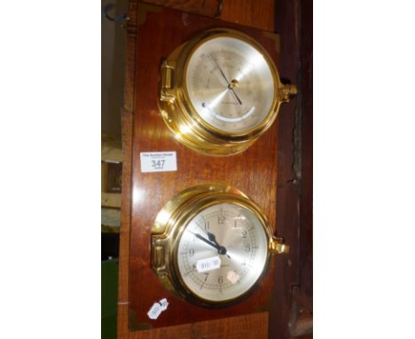 A Garside &amp; William 'ships' barometer and clock mounted on wood panel