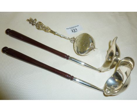 Two German silver toddy ladles and an ornate .800 Continental silver tea infuser with harpy to finial