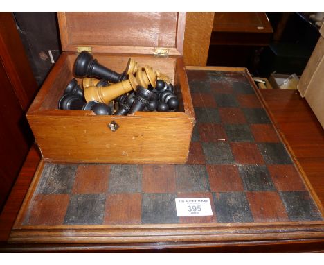 Wooden carved chess set and stained board