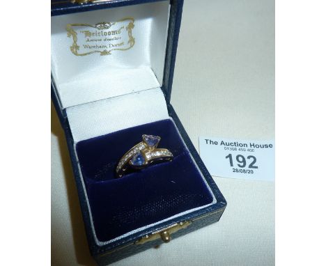 14k gold ring set with diamonds and blue stones, approx. size UK "M"