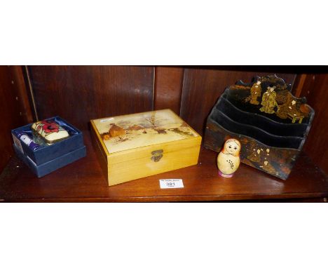 Victorian lacquered papier-mache letter rack, a sewing cottons box with pictorial decoration, small Russian doll and a modern