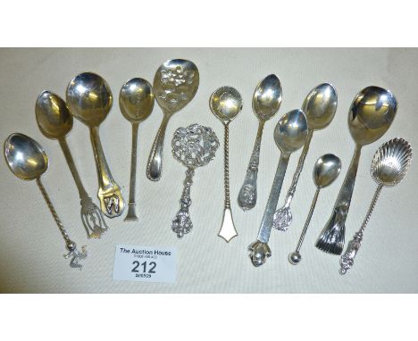 Thirteen hallmarked silver spoons including a tea caddy spoon, a Mexican spoon with a cat finial and another with a duck-bill