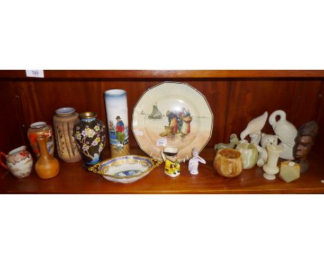 Royal Doulton "fishwives" plate, a Cloisonné vase on stand, other china and onyx etc. (one shelf)