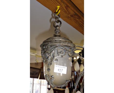 Contemporary glass and metal porch light in the Rococo style