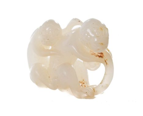 CHINESE JADE CARVED MONKEYS. A beautiful example of pale jade carved with two monkeys. Size: L:34mm / W:40mm ; 27.3g Provenan