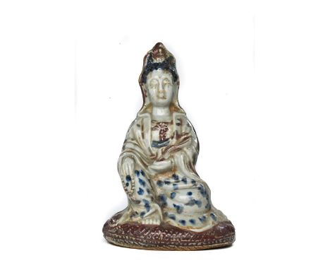 CHINESE PORCELAIN GUANYIN STATUE. Very interesting porcelain statuette of Guanyin depicted seated on her knees, wearing a los