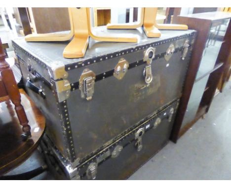 A LARGE FIBRE AND METAL BOUND CABIN TRUNK 